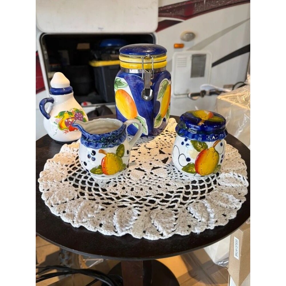 mixed kitchenware set designed in a vibrant, Mediterranean "Tuscan Orchard" styl